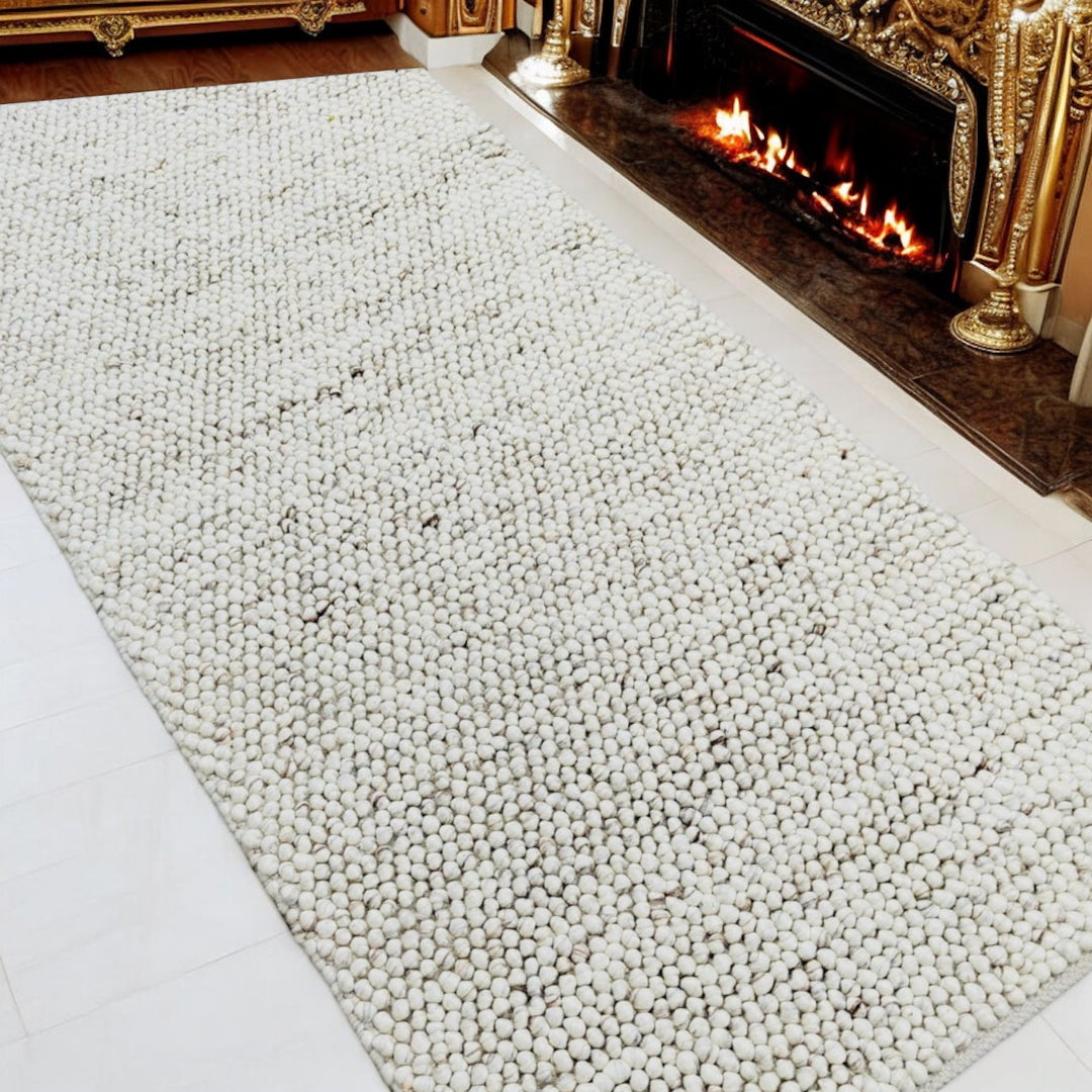 Care Instructions for Pebbles Handwoven Wool Rugs