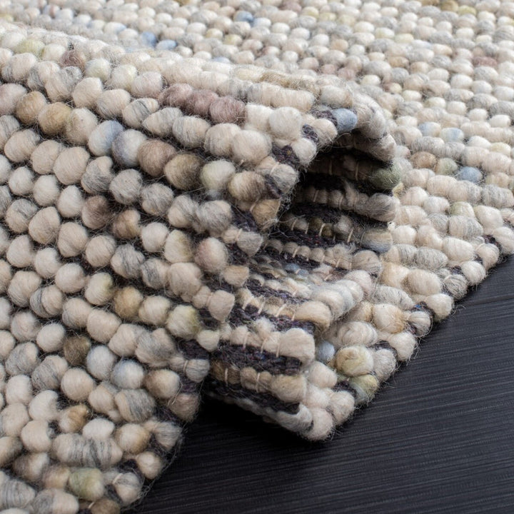 Pebbles Hand Woven Wool Ivory Multi color Rug